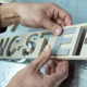Lettering in ceramic tile Water Jet cut